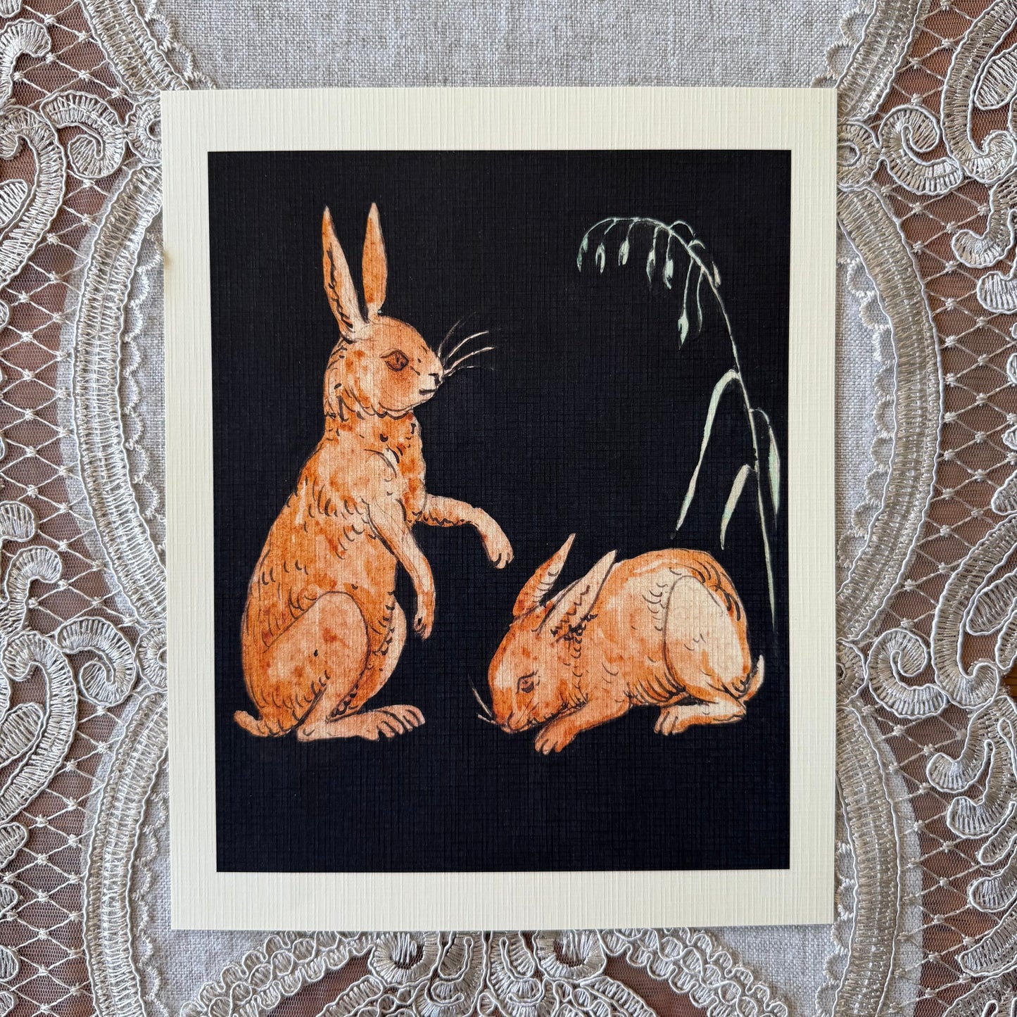 Two Hares Playing