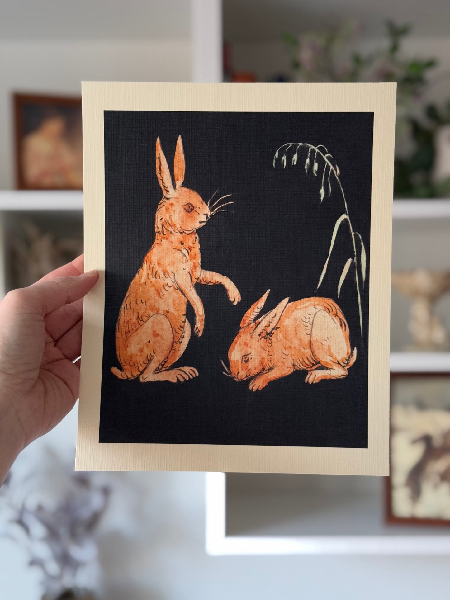 Two Hares Playing